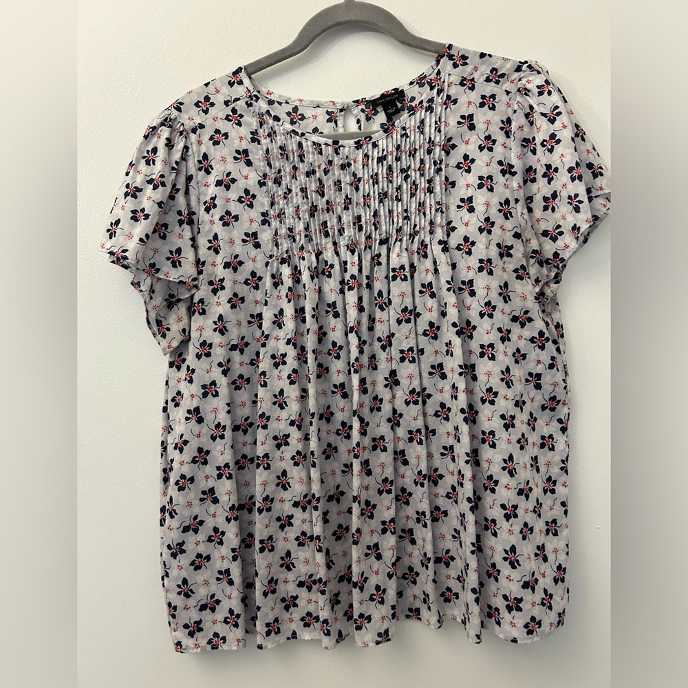 Ann Taylor pintucked flutter sleeve top with blue and red floral design